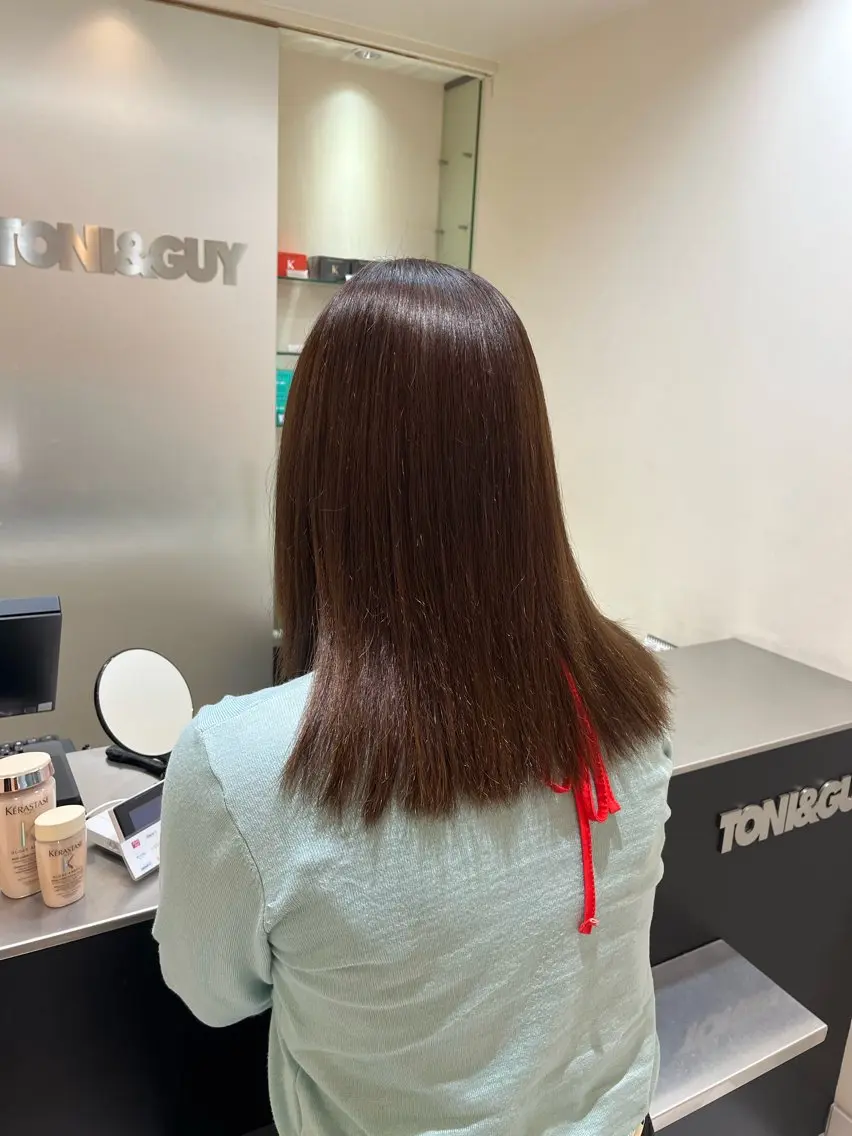 ミディアム パーマ お団子ヘア 縮毛矯正 新開 夏菜のヘアスタイル