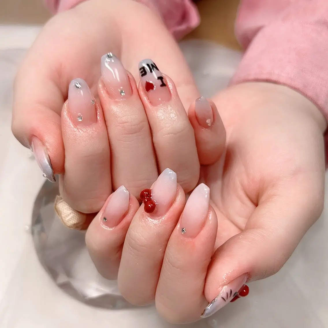 ネイル チークネイル ハート リボン Cute Tips nailのネイルデザイン