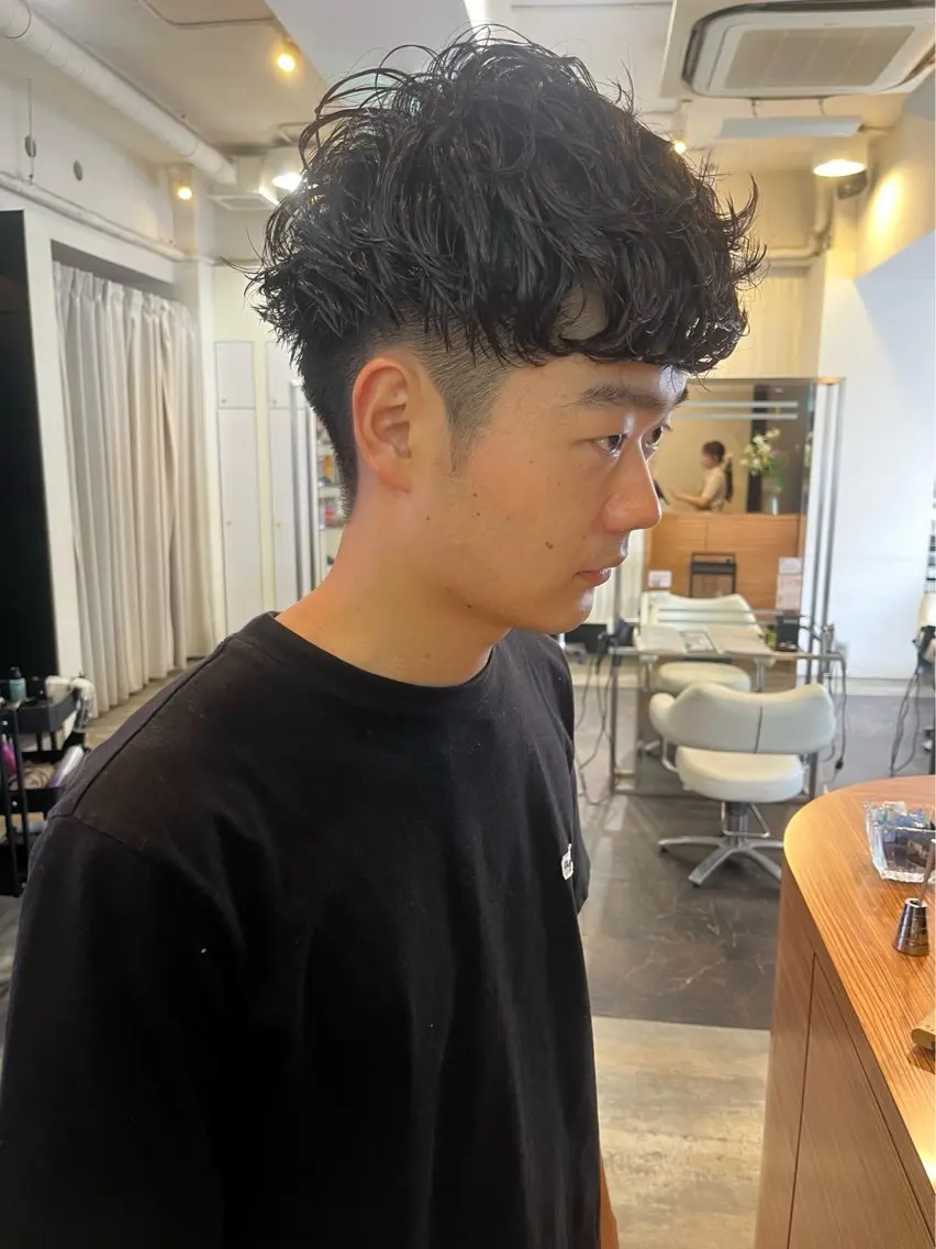 パーマ　¥3,300~の写真