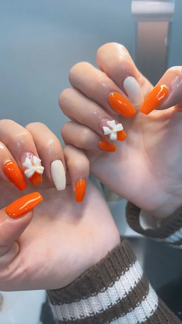 ネイル フレンチネイル ワンカラーネイル オレンジ リボン ハンドネイル 鶴橋wooone nail.rieのネイルデザイン