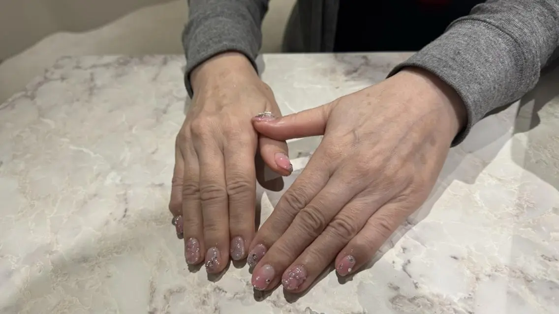 ネイル キラキラネイル ピンク リボン ハンドネイル Nail Salon Lindaのネイルデザイン