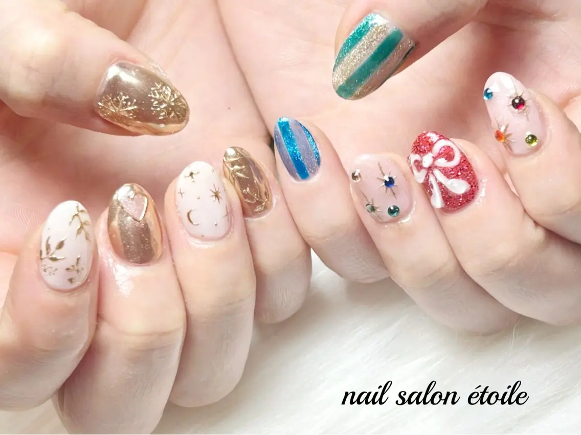 ネイル ゴールド ハート マグネットネイル ミラーネイル リボン ハンドネイル nail salon étoileのネイルデザイン