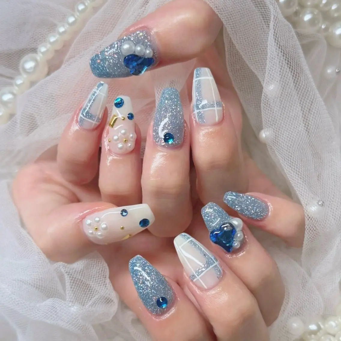 ネイル ブルー 成人式 ジェルネイル キラキラネイル ラメ(グリッター) ハンドネイル Nail lieNのネイルデザイン