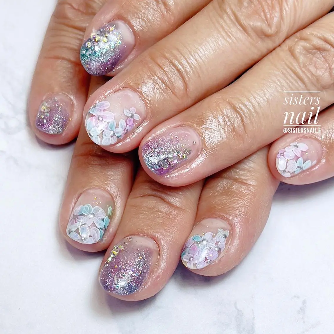 ネイル アートネイル ブルー キラキラネイル ラメ(グリッター) パープル sisters nail.fのネイルデザイン