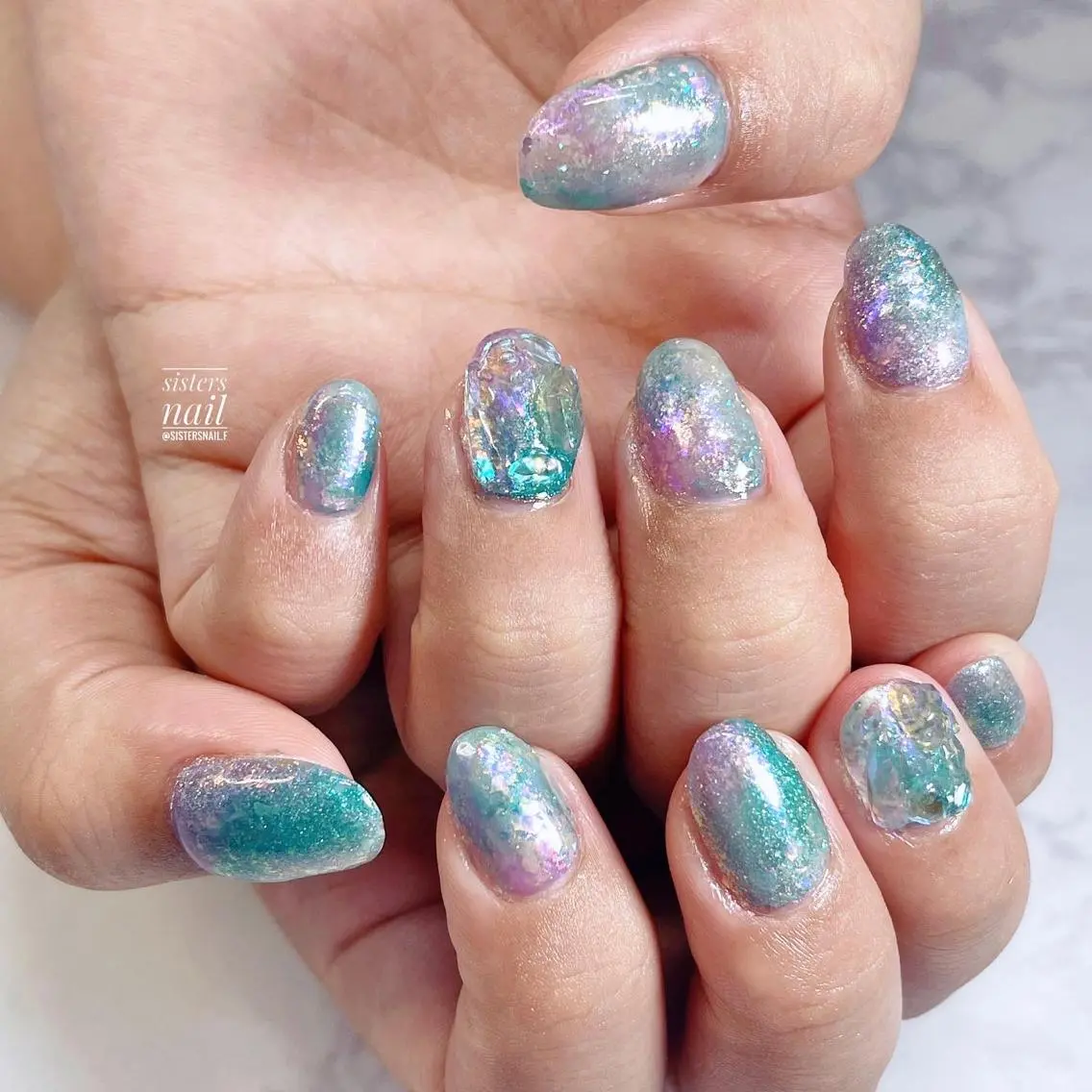 ネイル アートネイル オーロラネイル ブルー 氷ネイル・うるうるネイル ラメ(グリッター) sisters nail.fのネイルデザイン