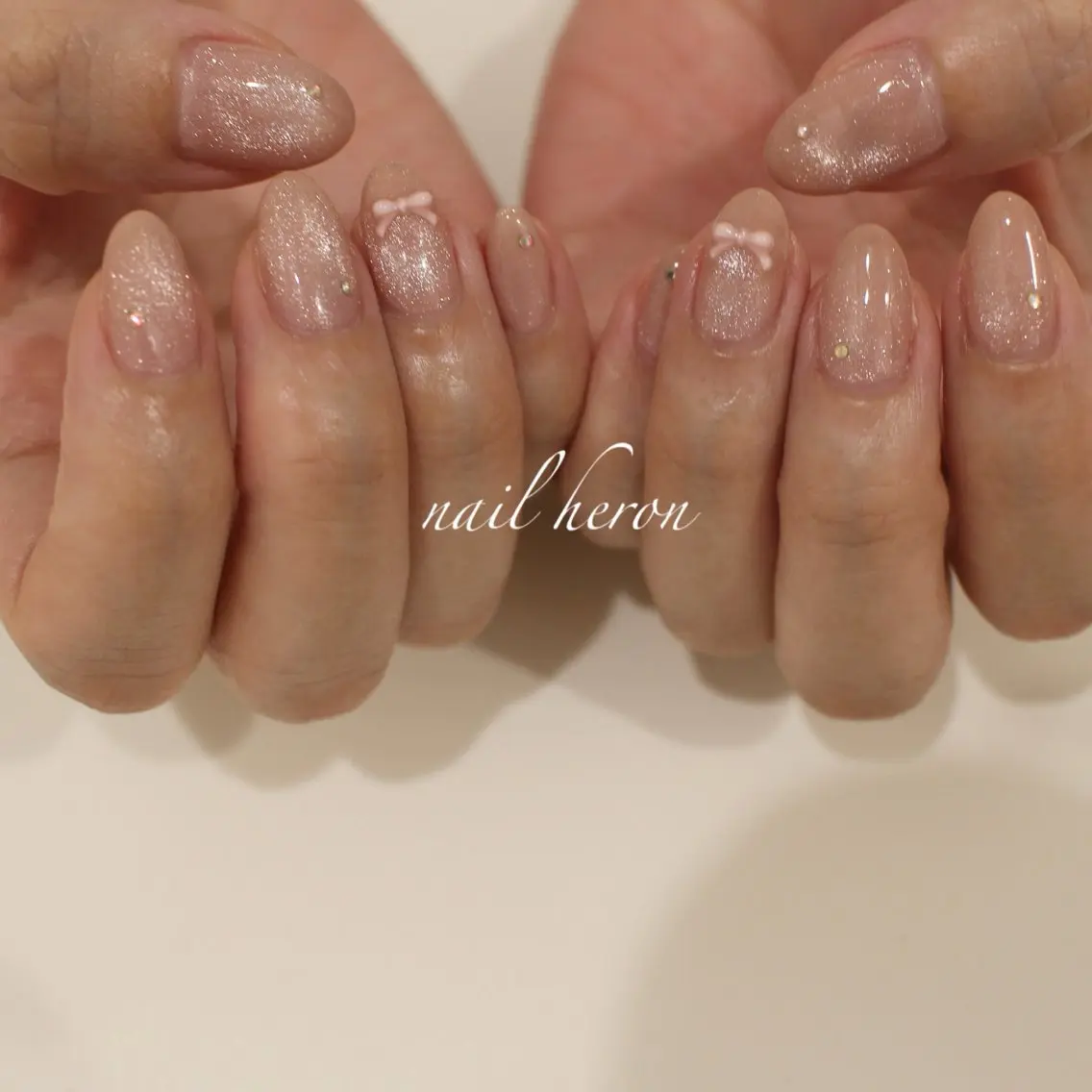 ネイル リボン ハンドネイル saki_ nail heronのネイルデザイン