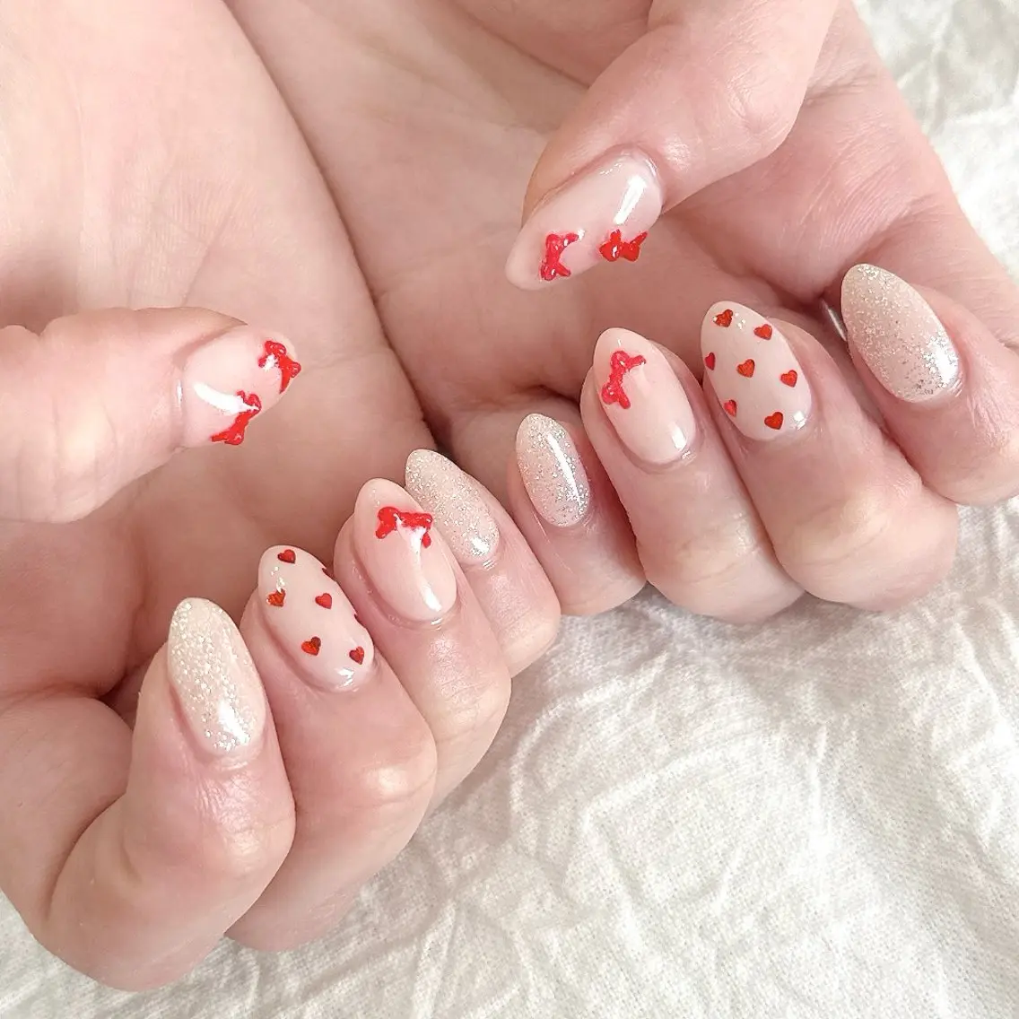 ネイル ハート 赤色 リボン ハンドネイル peaberry nailのネイルデザイン