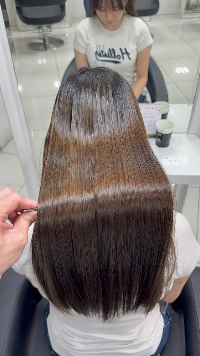 パーマ 仲里 茉緒のヘアスタイル