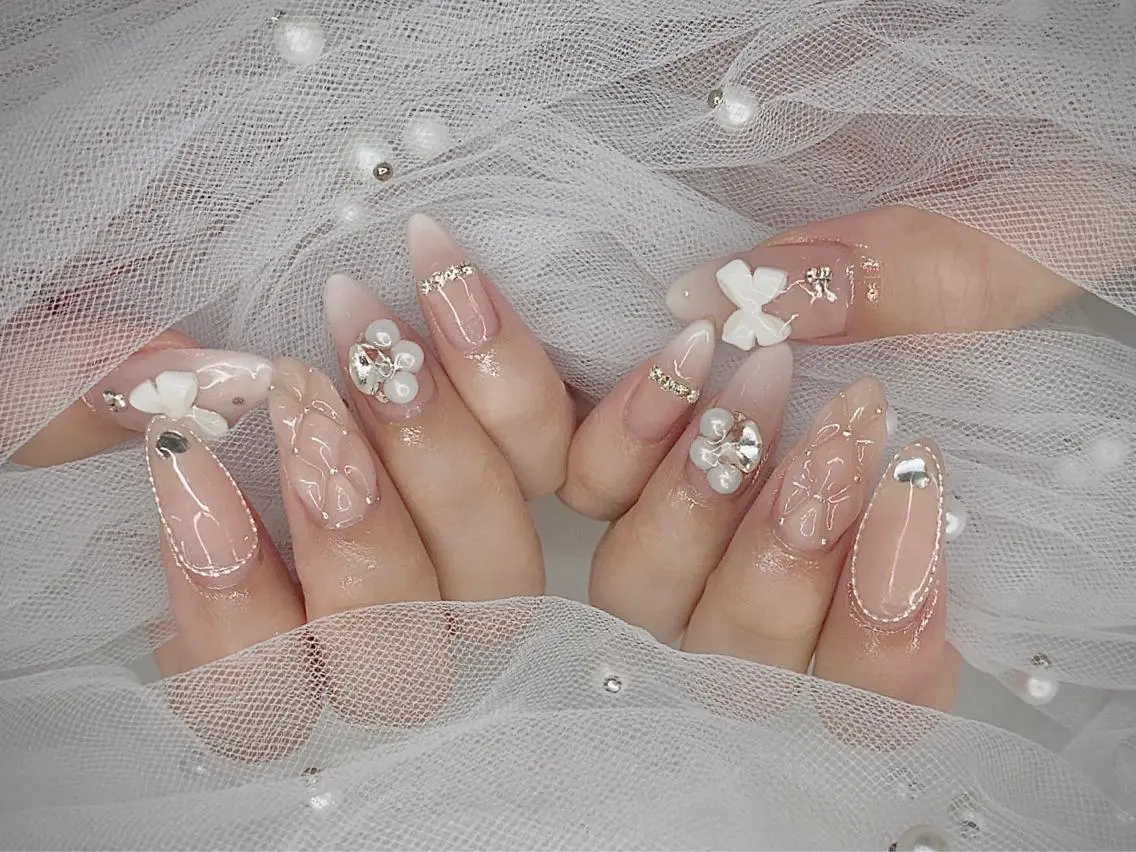 ネイル リボン ワンホンネイル ハンドネイル I-nailロング /ワンホン/キラキラのネイルデザイン