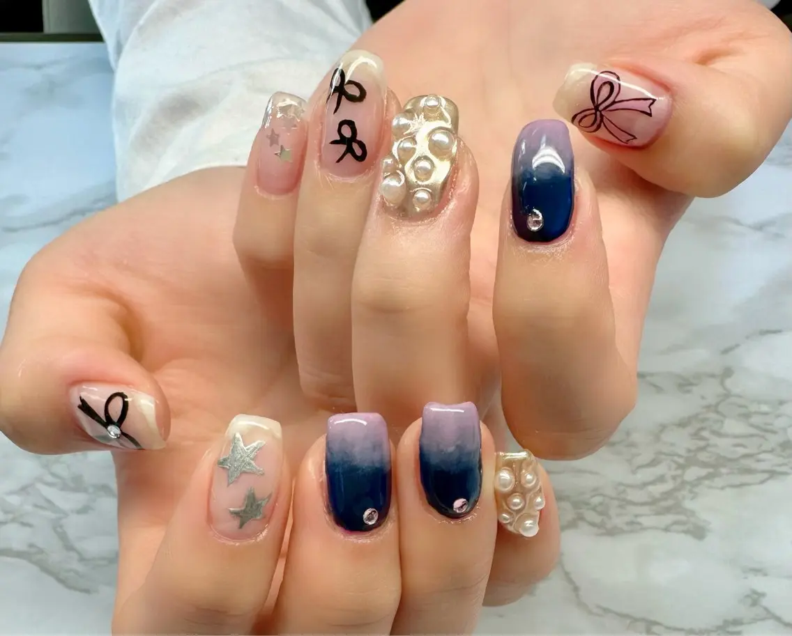 ネイル アートネイル ニュアンスネイル ワンカラーネイル リボン 春ネイル Mai’s nailのネイルデザイン