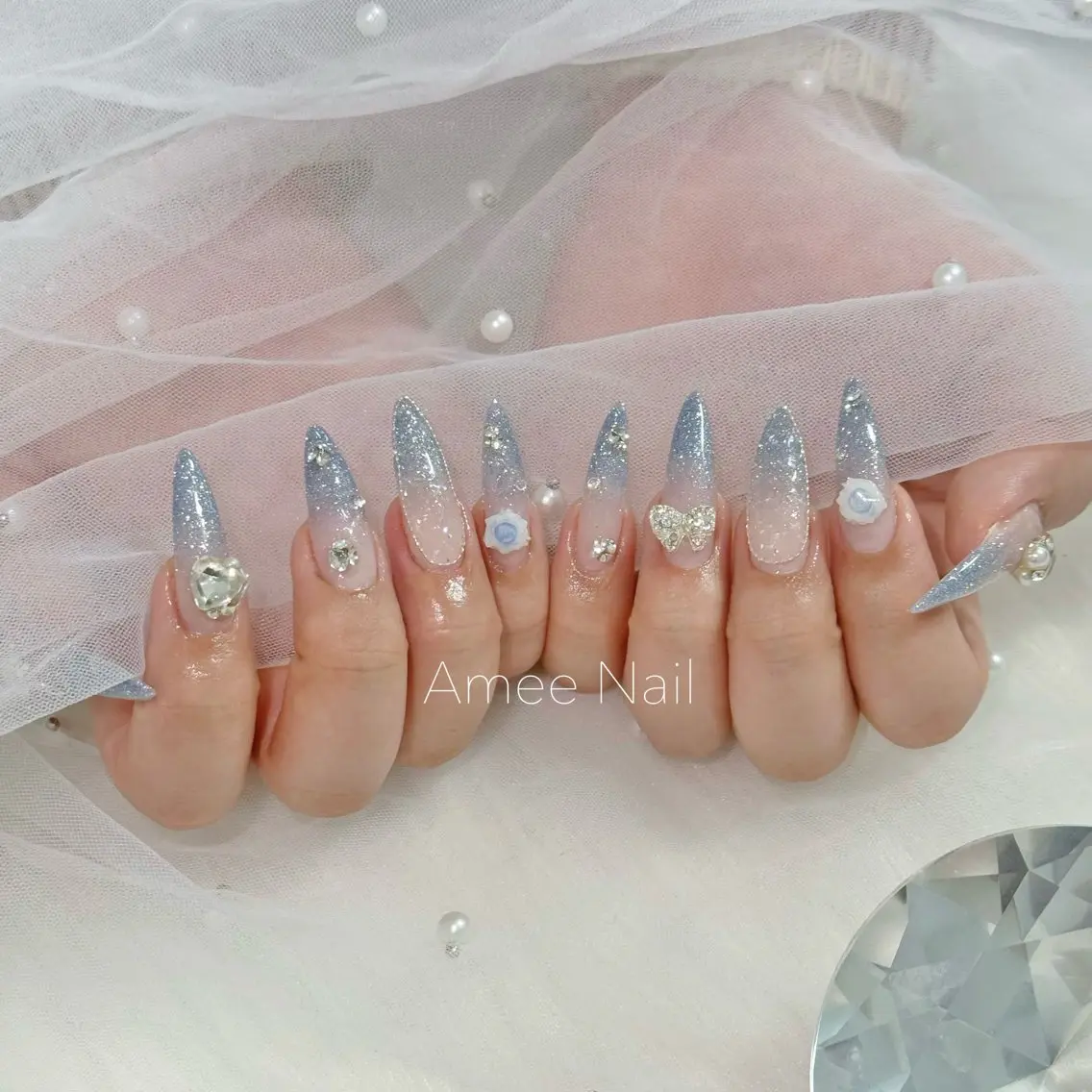 ネイル 成人式 ロングネイル マグネットネイル 大理石ネイル(マーブル) リボン ハンドネイル Amee Nail Salonのネイルデザイン