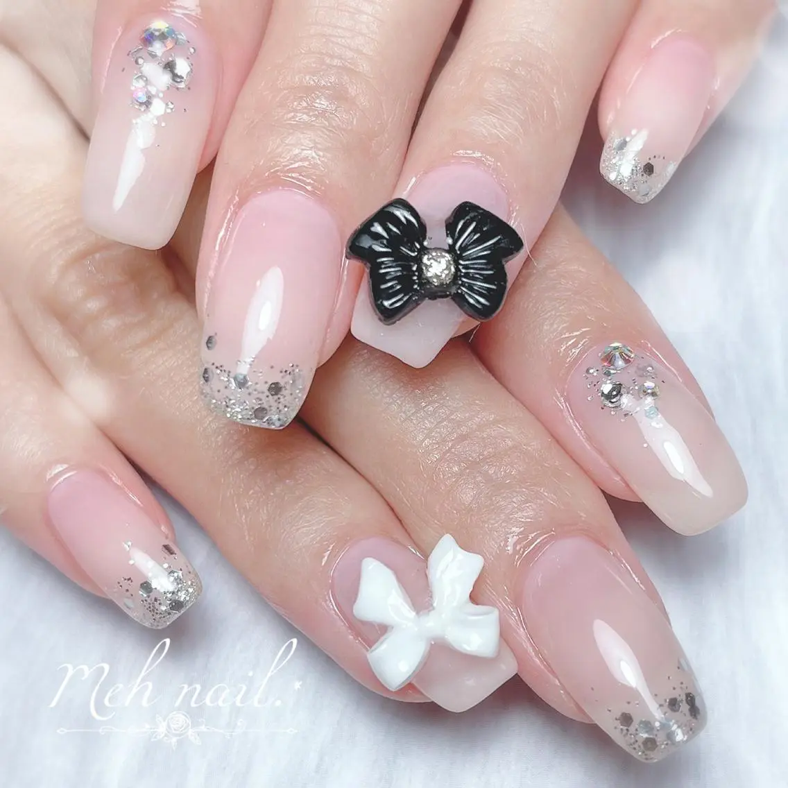 ネイル リボン ハンドネイル フットネイル Healing nail 杢のネイルデザイン