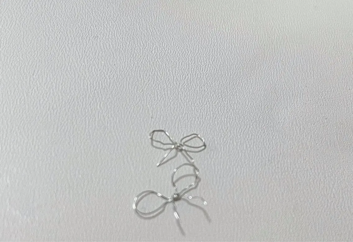 ネイル リボン 🦋y y Nail 🤍のネイルデザイン