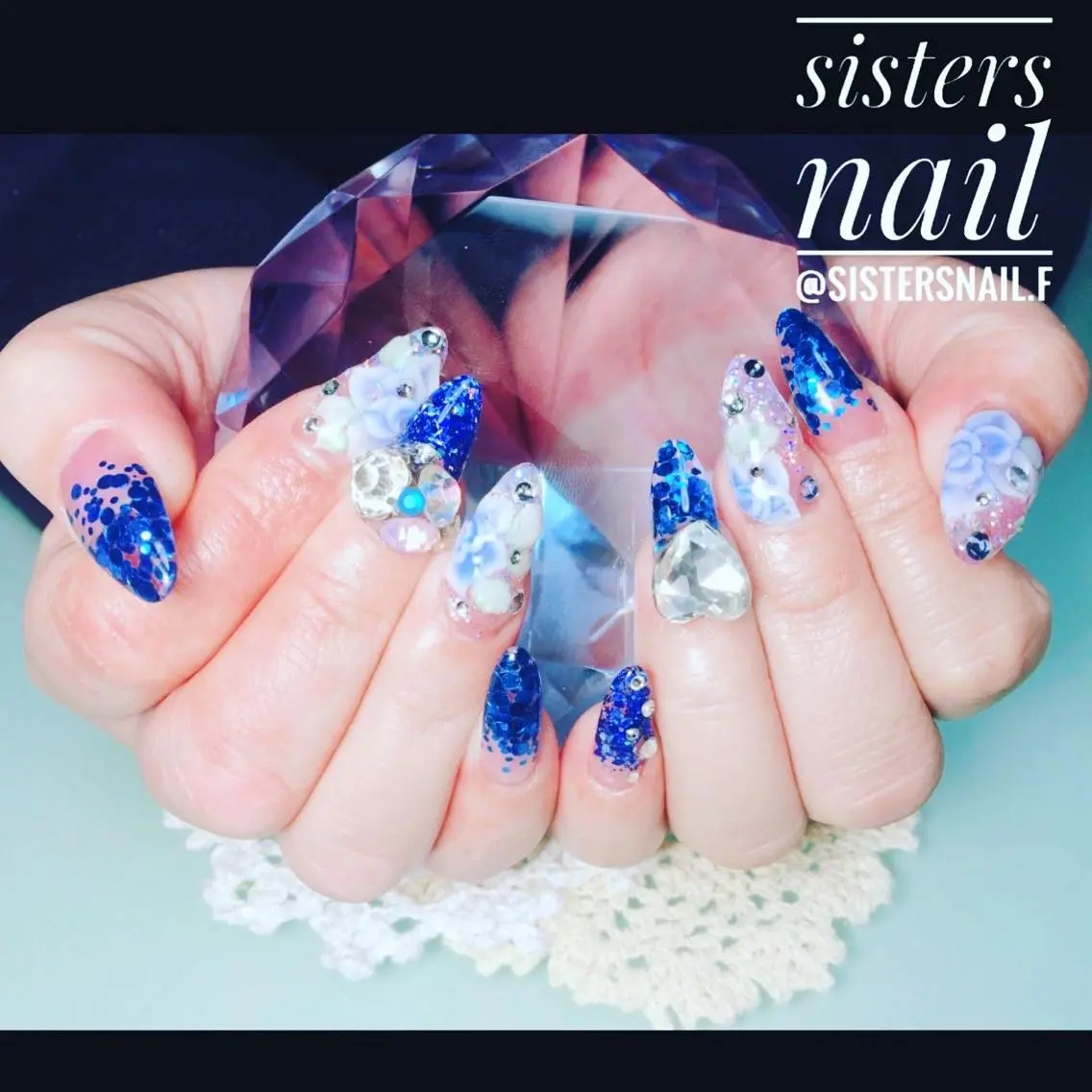ネイル アートネイル ブルー クリアネイル 成人式 フラワーネイル sisters nail.fのネイルデザイン