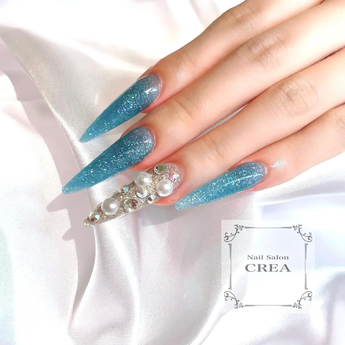 ロング ネイル ロング アートネイル 水色 ロングネイル スカルプネイル NailSalon CREAのネイルデザイン