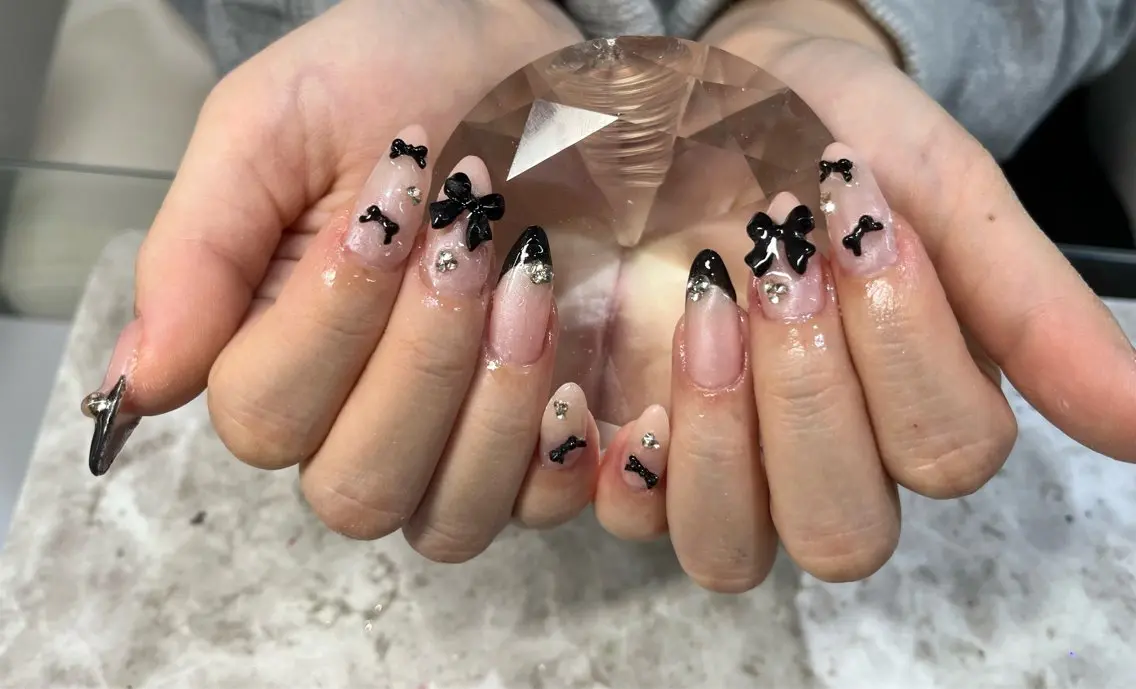 ネイル リボン Nail ecxia ／Reikaのネイルデザイン