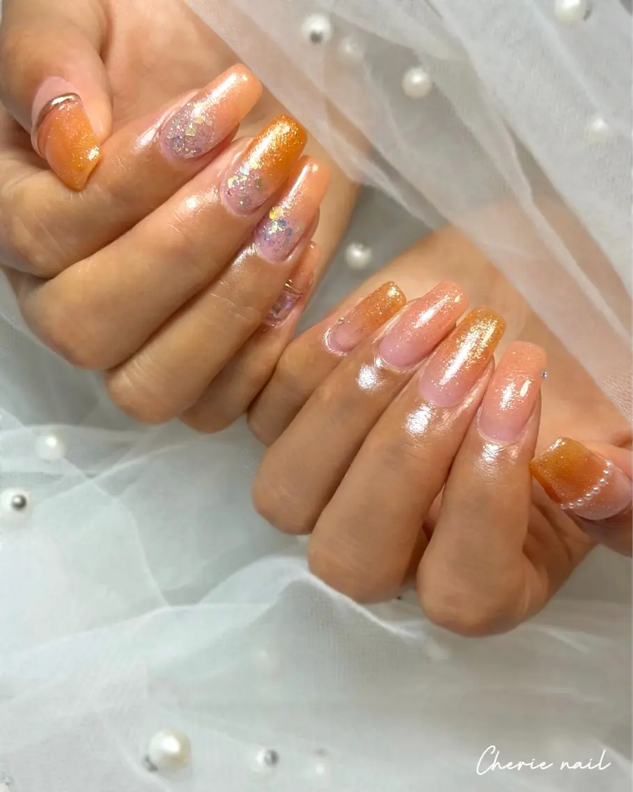 ネイル ジェルネイル グラデーション キラキラネイル ラメ(グリッター) オレンジ ハンドネイル Cherienail yunaのネイルデザイン