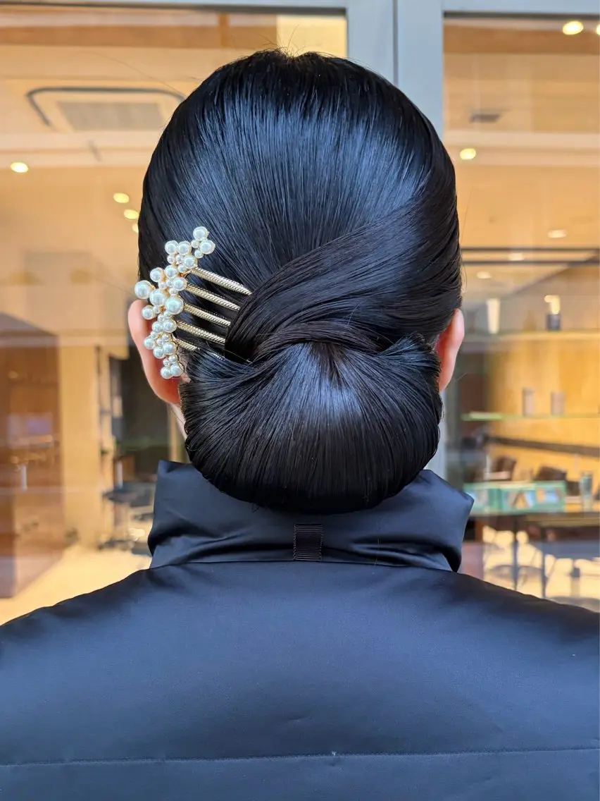 お呼ばれヘアセット／シニヨン・編みおろしetc...の写真