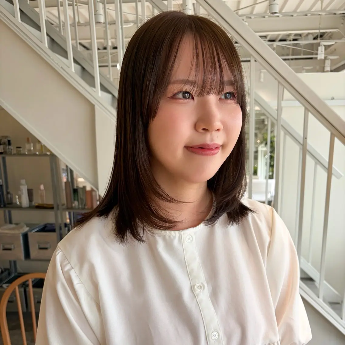 ミディアム カラー アッシュ 透明感カラー オレンジ ヘアカラー 周東 芽依のヘアスタイル