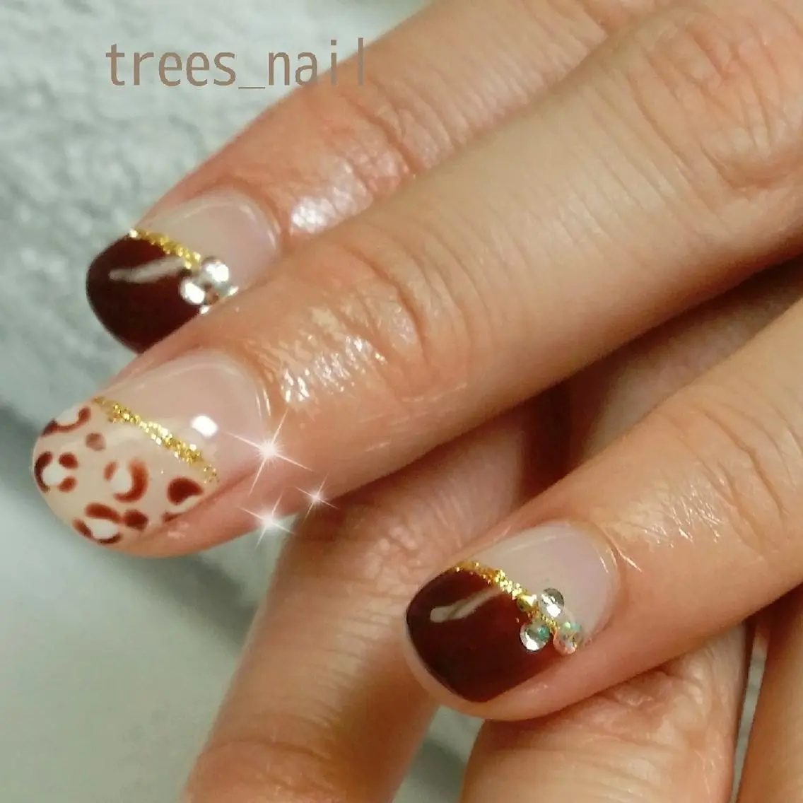 ネイル アニマル柄 ブラウン フレンチネイル ハンドネイル フットネイル trees_ nailのネイルデザイン