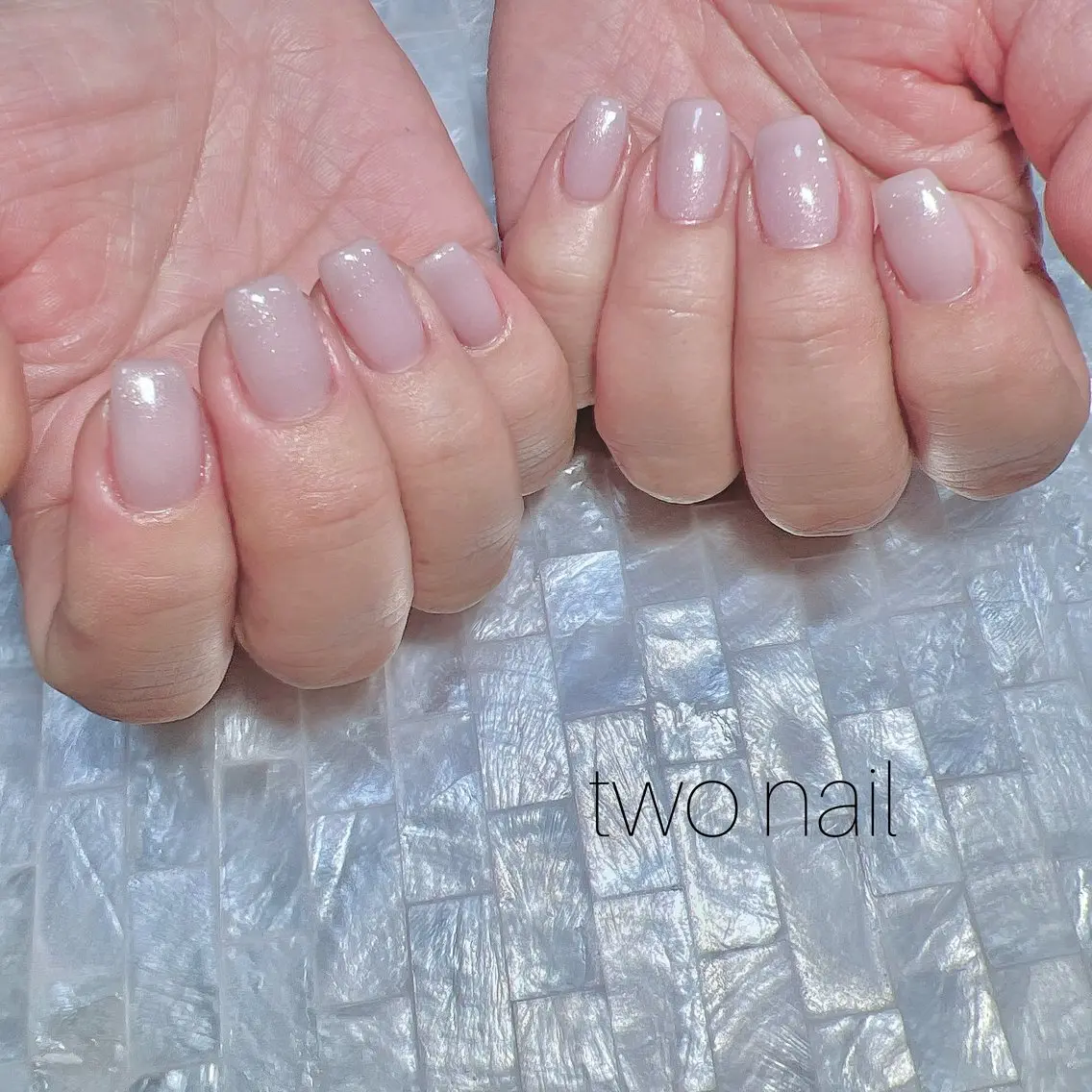 ネイル キラキラネイル ネイルチップ ホワイト ハンドネイル two nailのネイルデザイン