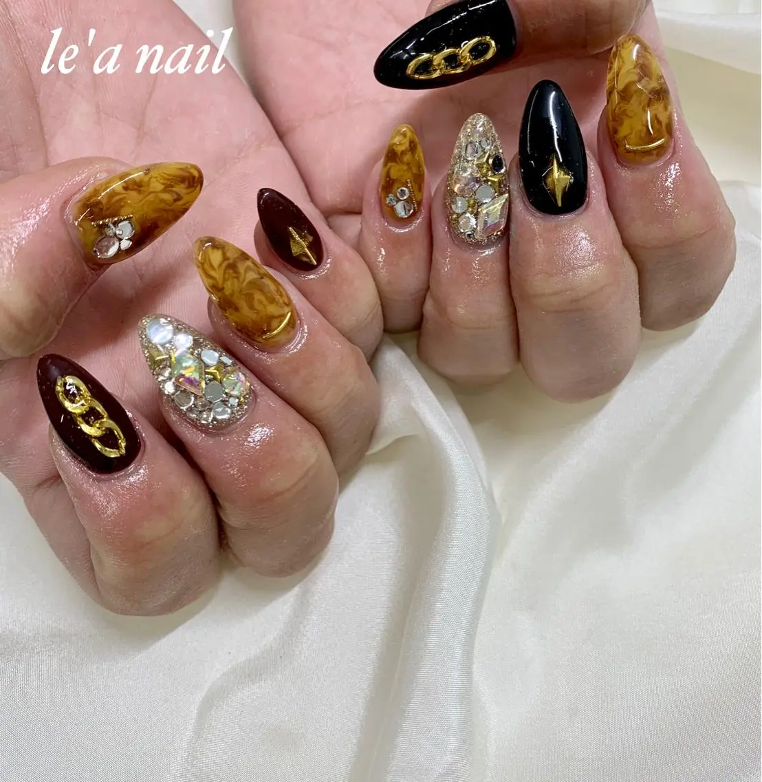 ネイル アートネイル べっ甲ネイル ボルドー キラキラネイル ニュアンスネイル pu muのネイルデザイン