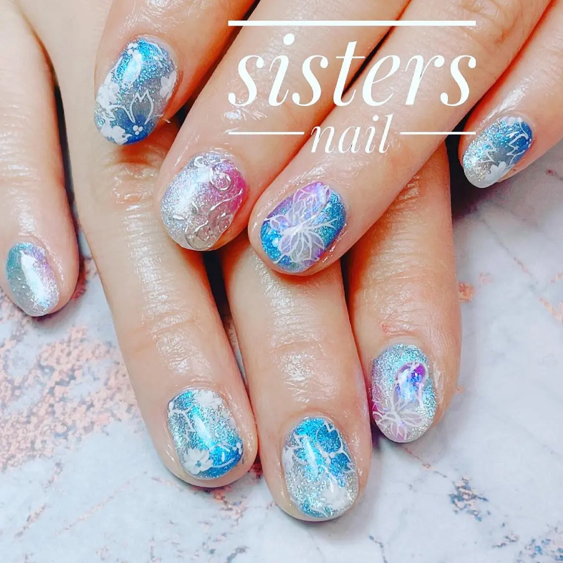 ネイル アートネイル ブルー 桜ネイル フラワーネイル ジェルネイル ハンドネイル ハンドケア sisters nail.fのネイルデザイン