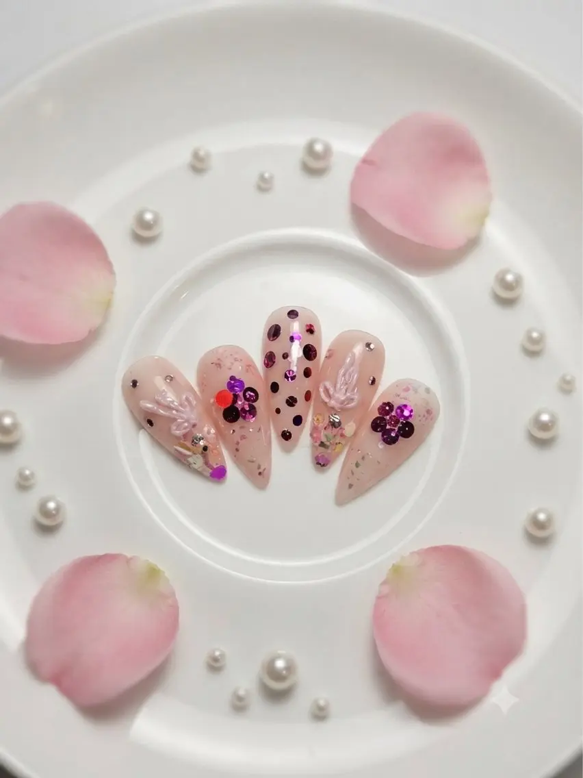 ネイル ホログラムネイル ラメ(グリッター) ピンク リボン ストーンネイル Michan Nailのネイルデザイン