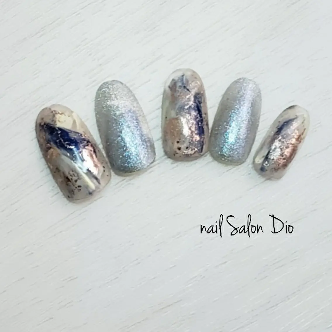 ネイル オーロラネイル マグネットネイル ニュアンスネイル 黄色 Nail salon Dioのネイルデザイン