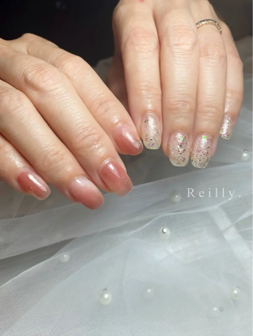 ネイル フラッシュネイル フレンチネイル ジェルネイル グラデーション ラメ(グリッター) ハンドネイル ハンドケア Marina 《REILLY.》のネイルデザイン