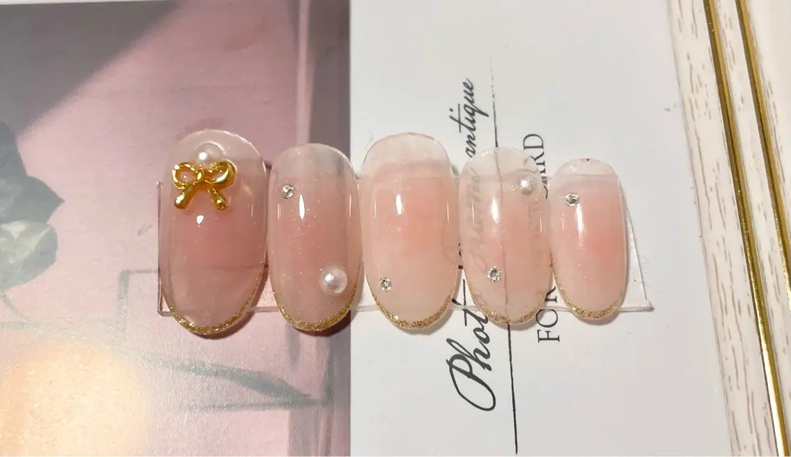 ネイル チークネイル ラメ(グリッター) ワンカラーネイル リボン nailsalon VENUSのネイルデザイン