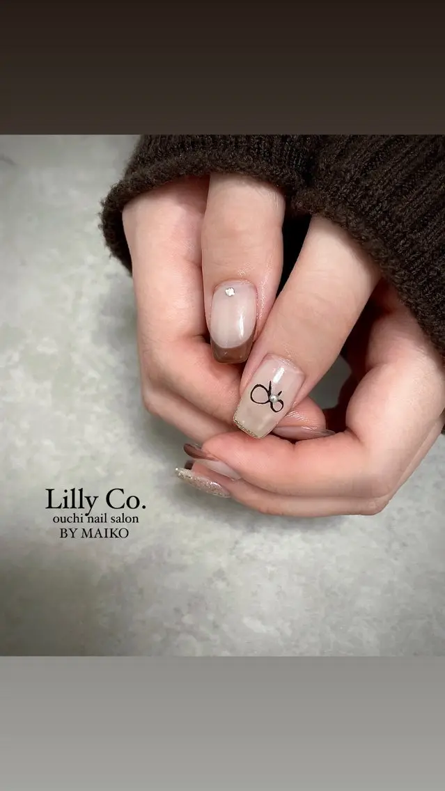 ネイル リボン Lilly Co.のネイルデザイン