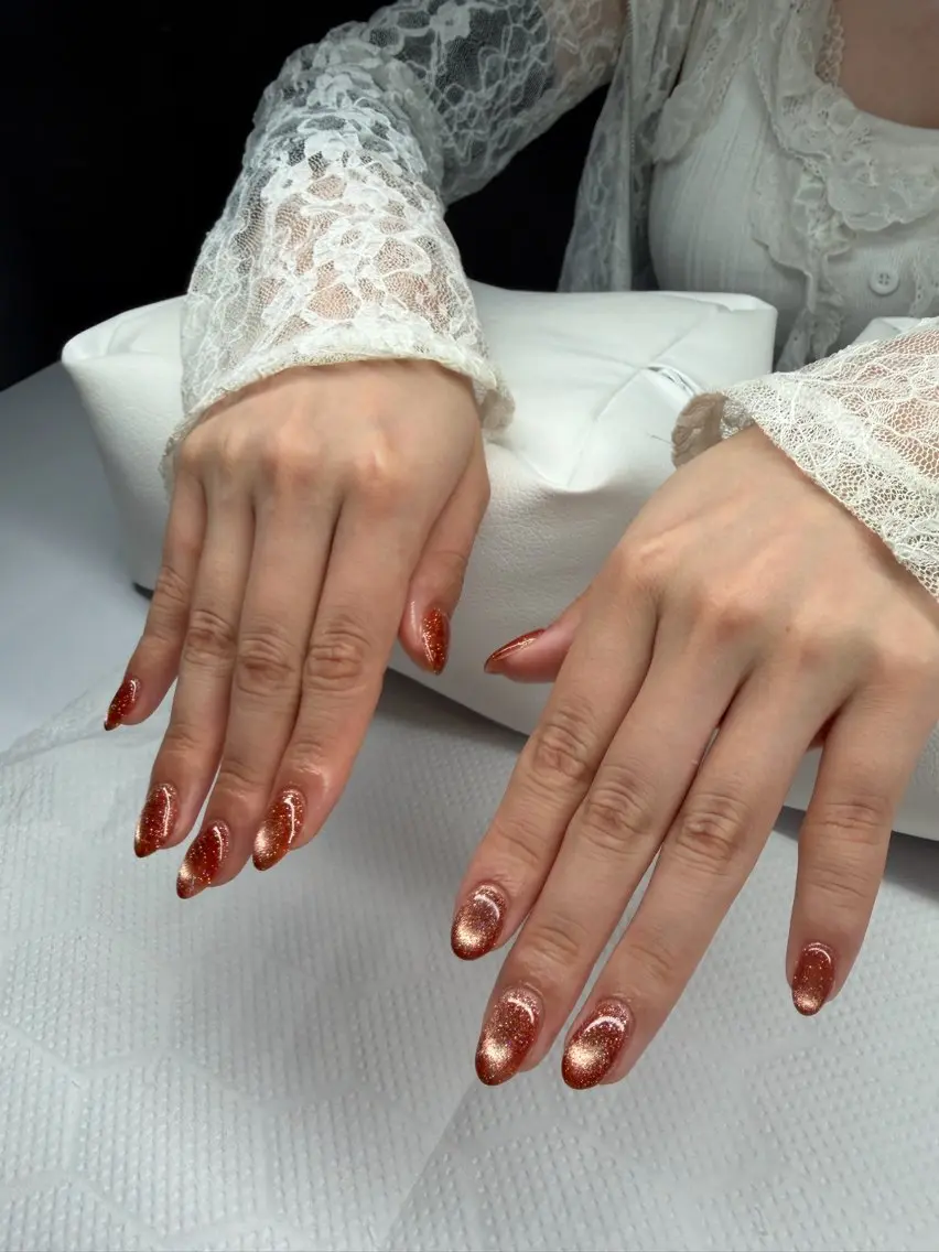 ネイル マグネットネイル オレンジ ハンドネイル eyelash& nailsalonMのネイルデザイン