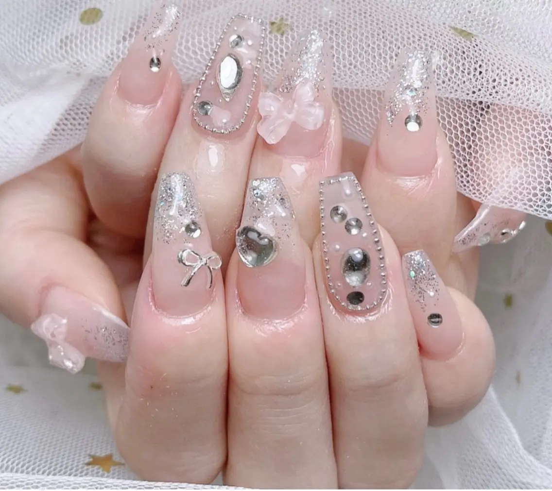 ロング E🌷nail 長さだし専門店のネイルデザイン