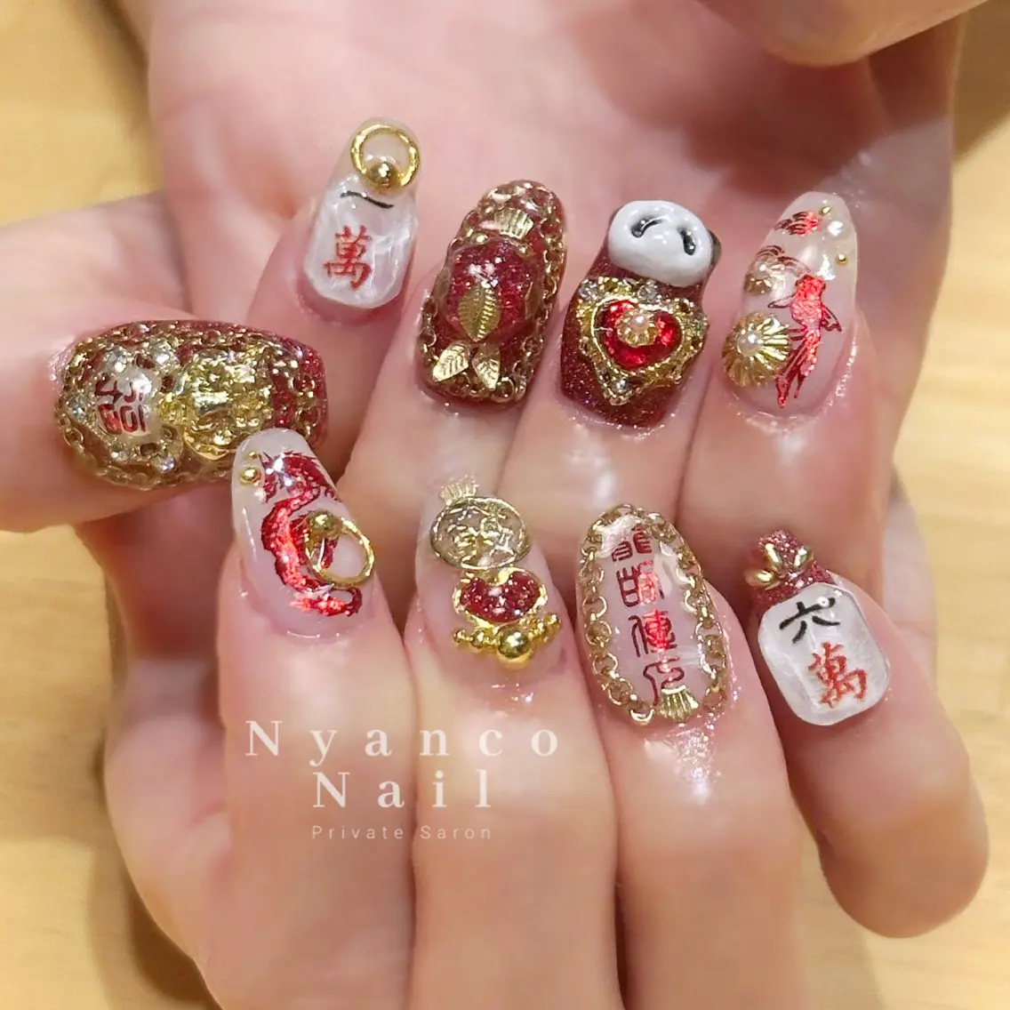 ネイル ジェルネイル キラキラネイル 韓国ネイル 赤色 春ネイル Nyanco Nailのネイルデザイン