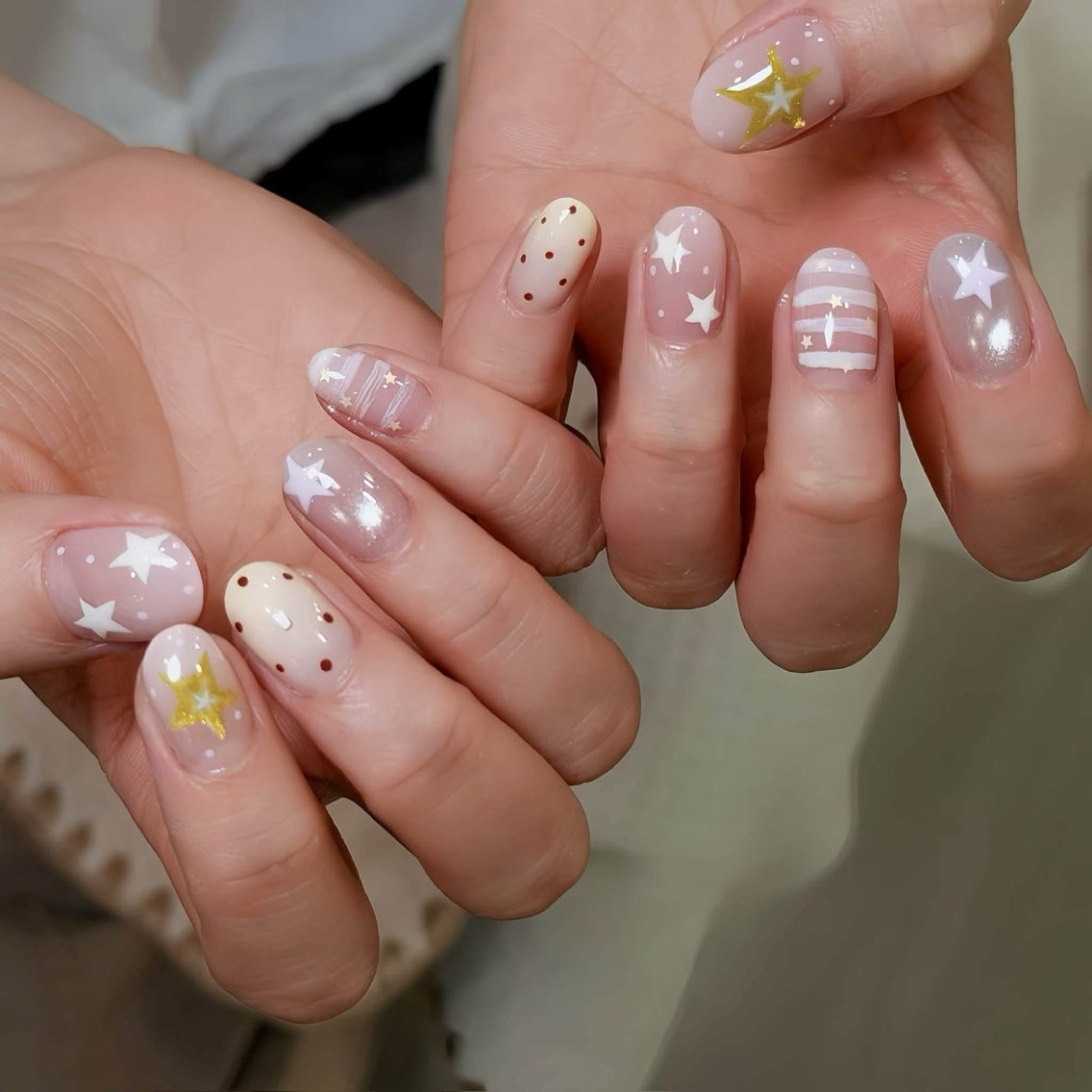 ネイル オーロラネイル 氷ネイル・うるうるネイル 韓国ネイル 水色 夏ネイル ハンドネイル FUKU♡Mii (キラキメネイル)のネイルデザイン