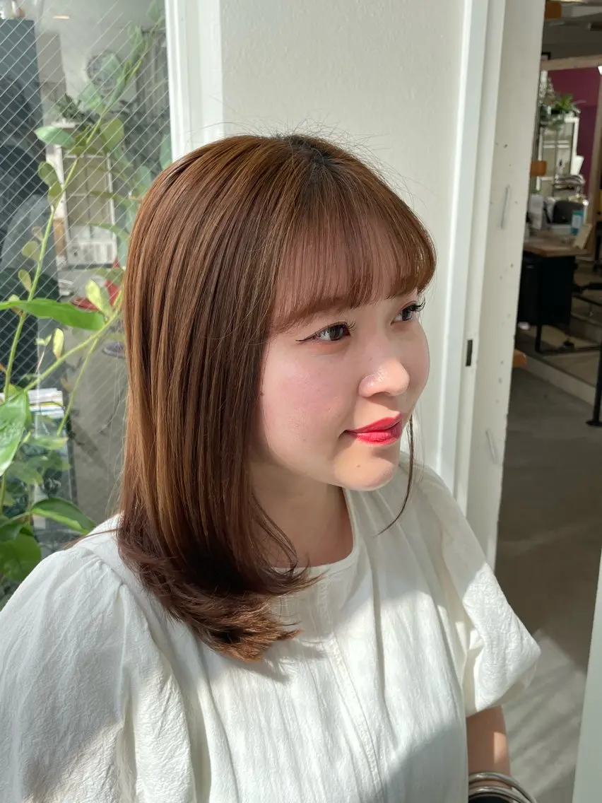 ミディアム ハヤシ ホマトラのヘアスタイル
