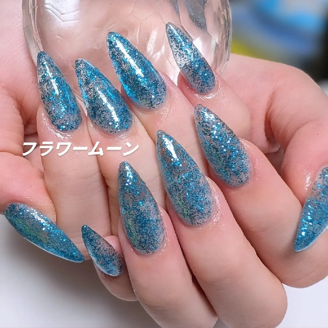 ネイル ブルー クリアネイル ラメ(グリッター) ハンドネイル ハンドケア フラワー ムーンのネイルデザイン