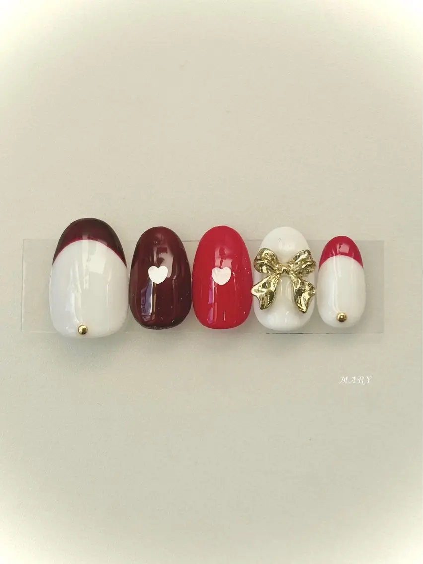 ネイル ハート ニュアンスネイル 赤色 リボン 冬ネイル ハンドネイル Mary nail .narumiのネイルデザイン