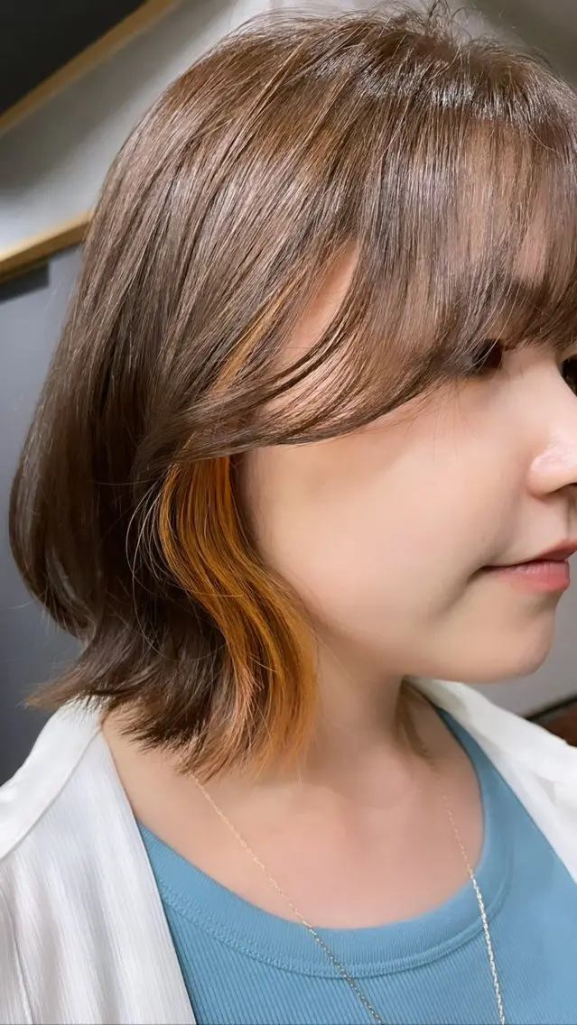カラー イヤリングカラー オレンジ ヘアカラー ヘッドスパ 岡田 真綾のヘアスタイル