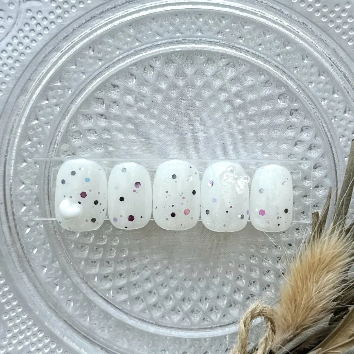 ネイル オーロラネイル ハート ラメ(グリッター) パープル リボン ハンドネイル peaberry nailのネイルデザイン