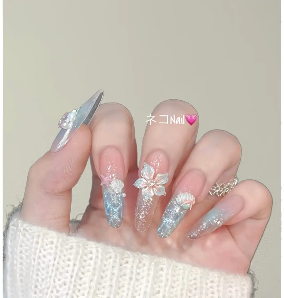 ネイル オーロラネイル ブルー ジェルネイル グラデーション 氷ネイル・うるうるネイル ハンドネイル ネコ Nailのネイルデザイン