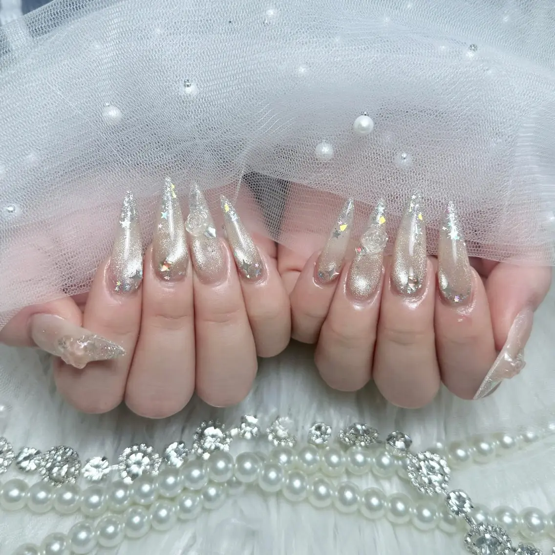 ネイル アートネイル 長さ出し ジェルネイル ガーリー キラキラネイル ハンドネイル Nova Nailのネイルデザイン