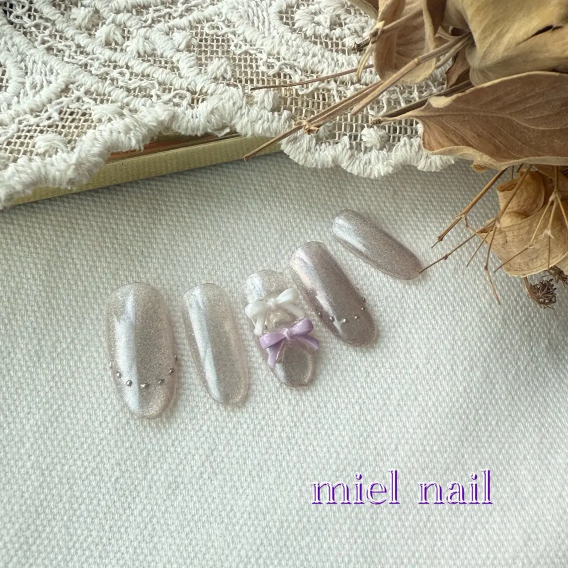 ネイル マグネットネイル パープル リボン 夏ネイル ハンドネイル miel nailのネイルデザイン