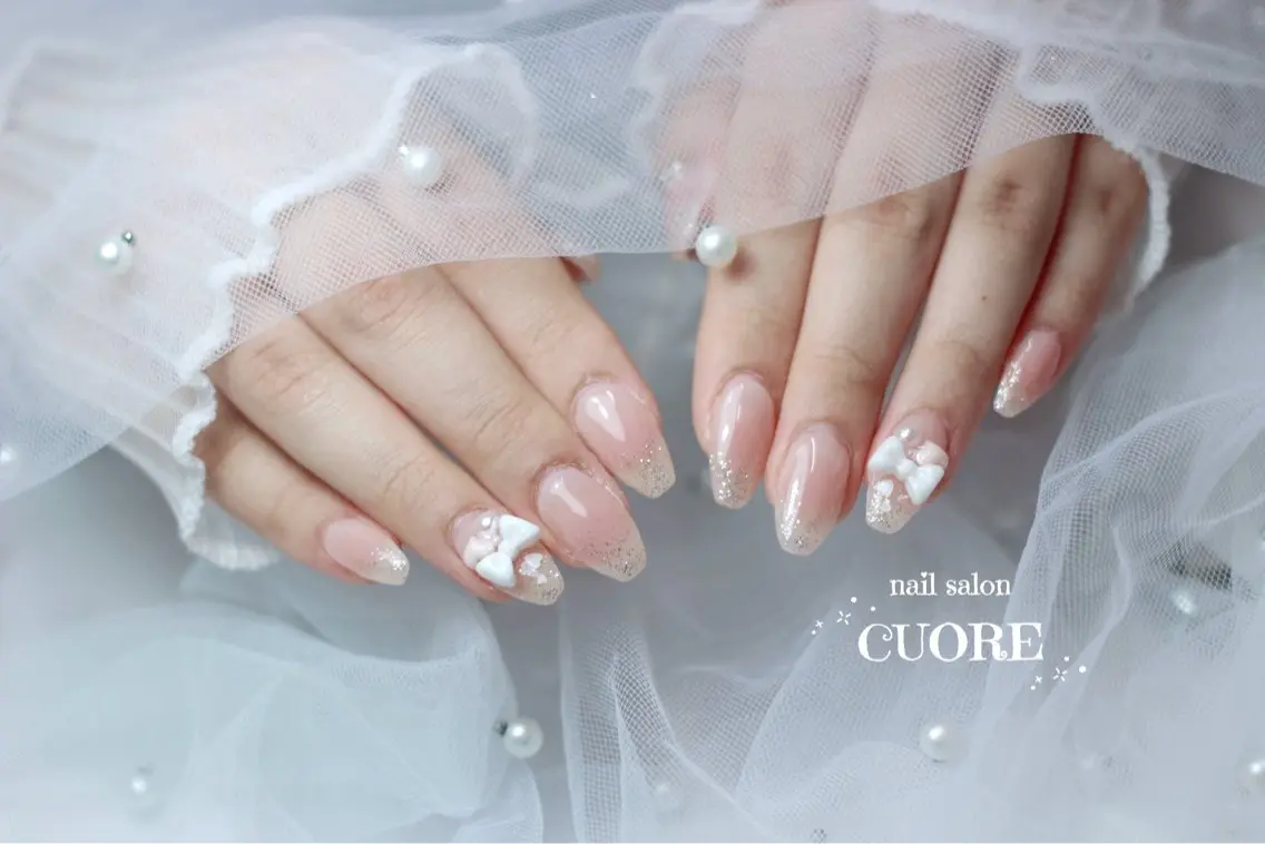 ネイル チークネイル 持ち込み リボン ハンドネイル nail salon CUOREのネイルデザイン