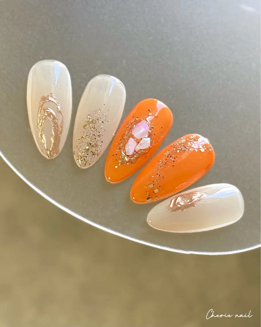 ネイル ジェルネイル ラメ(グリッター) ミラーネイル オレンジ Cherienail yunaのネイルデザイン