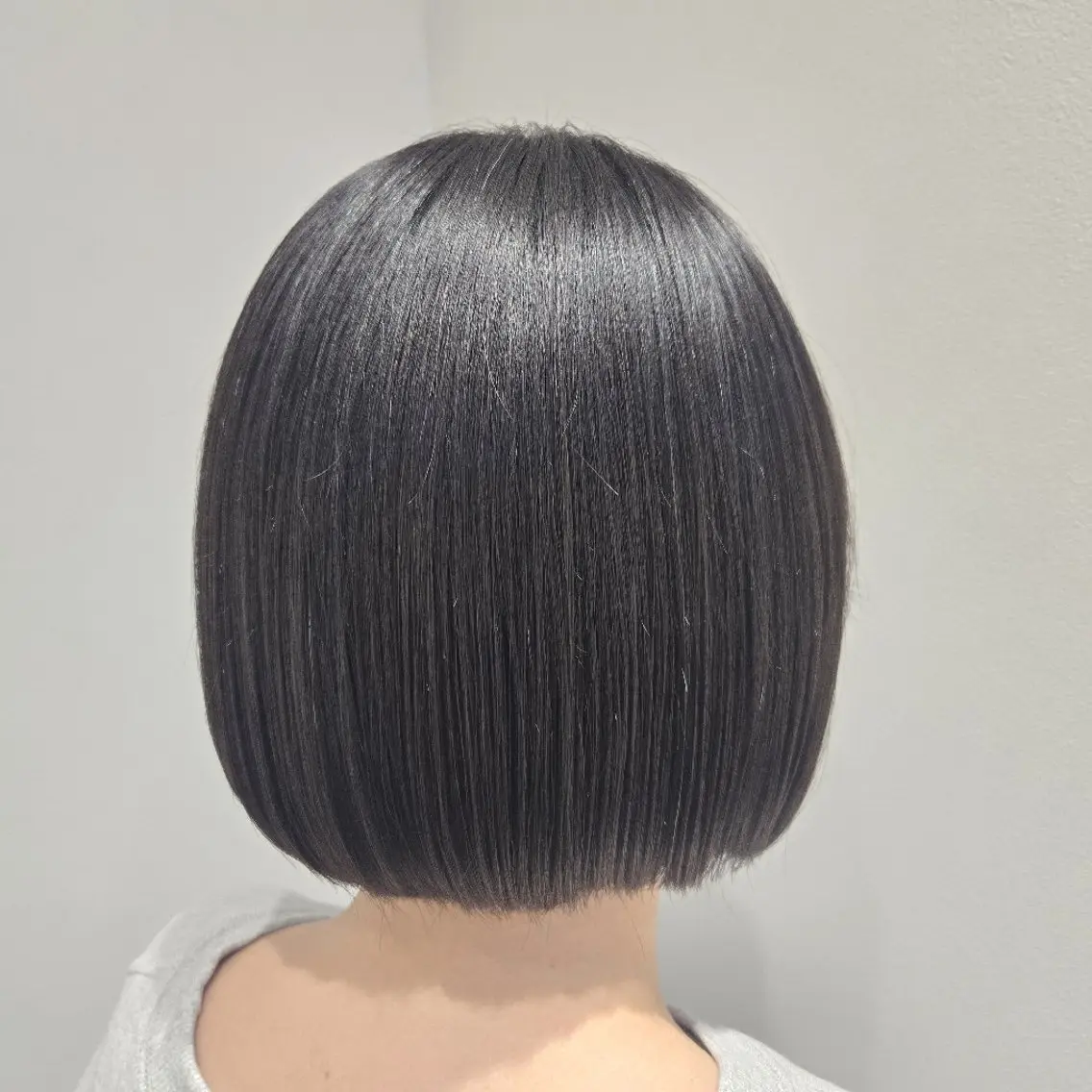 ゾーンカット+艶髪縮毛矯正+3stepハホニコトリートメント+超浸透促進アイロンの写真
