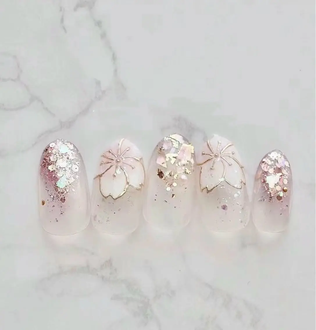 ネイル アートネイル キラキラネイル 韓国ネイル 水色 ロングネイル NailDemure 【銀座店】のネイルデザイン