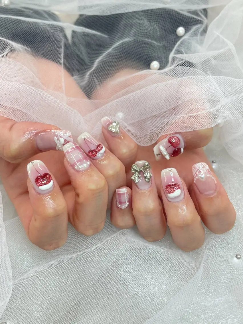 ネイル ハート 持ち込み リボン ストーンネイル ハンドネイル 五十嵐 美智のネイルデザイン