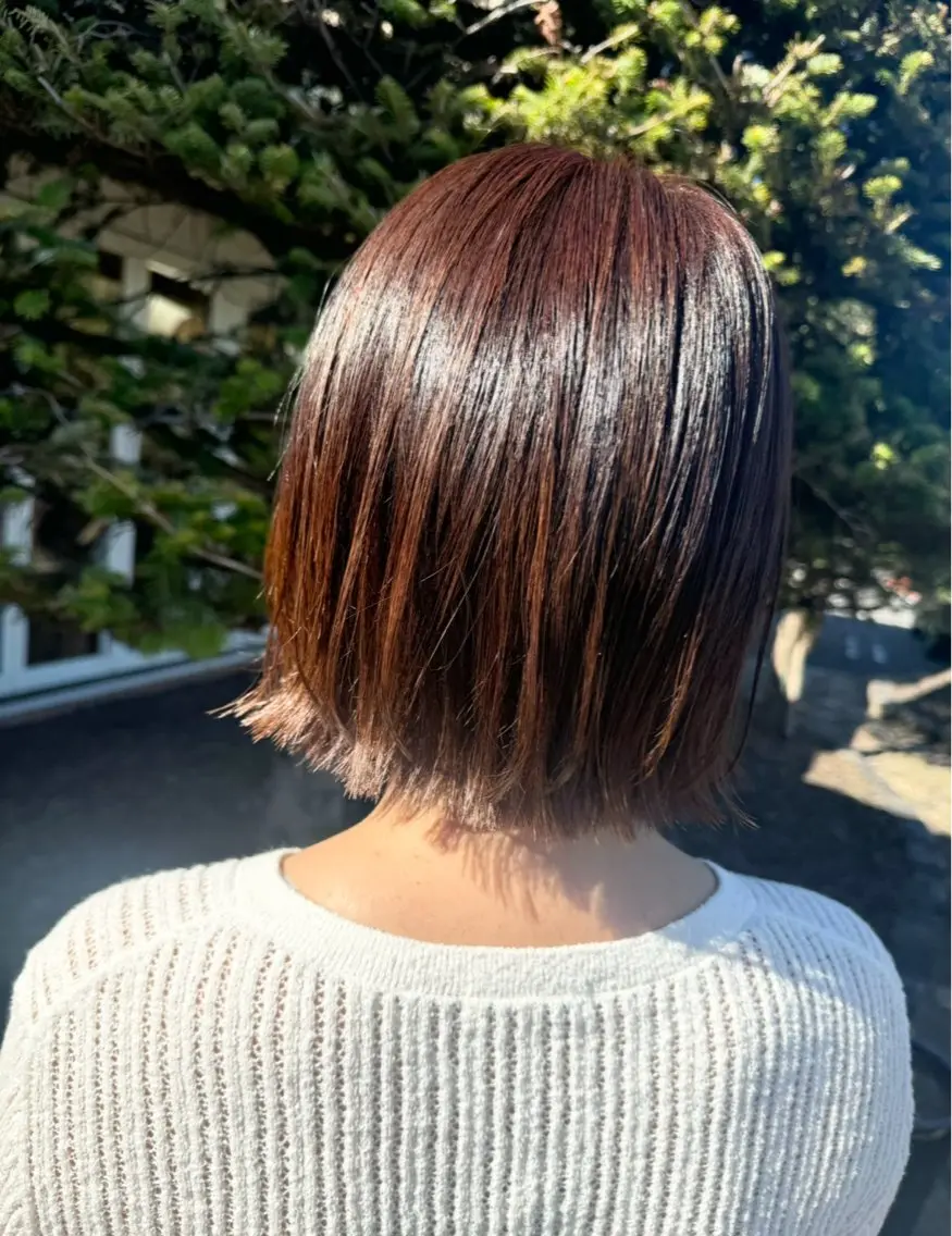 ショート カラー オレンジ ボブ カット ヘアカラー 𝒇𝒍𝒂𝒕/ 𝐇𝐈𝐍𝐀のヘアスタイル